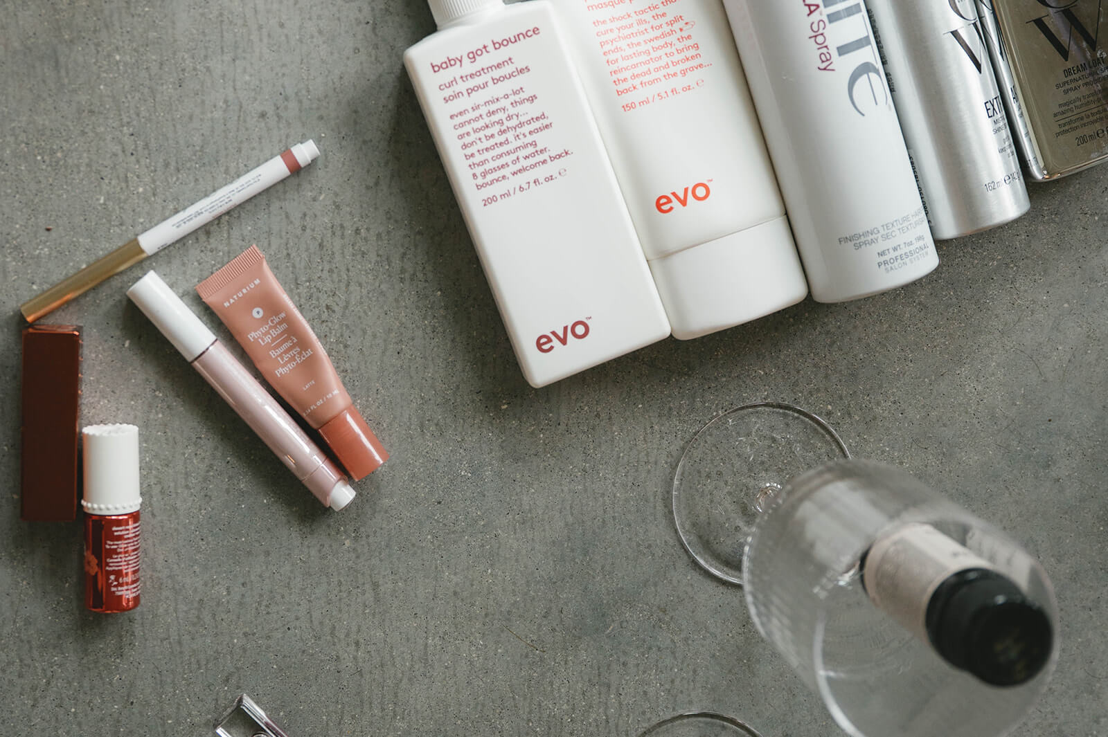 Salon Siwak luxury retail display featuring Evo, Unite, and Color Wow professional hair care products, available for purchase in Naples, Florida